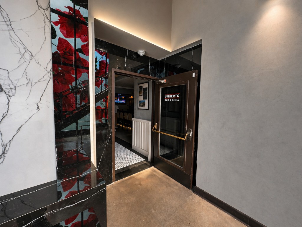 Modern entrance with Umberto branding